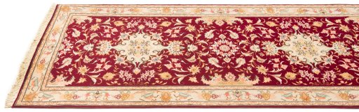 Corner detail of New Tabriz Silk rug showing border pattern and Wool pile