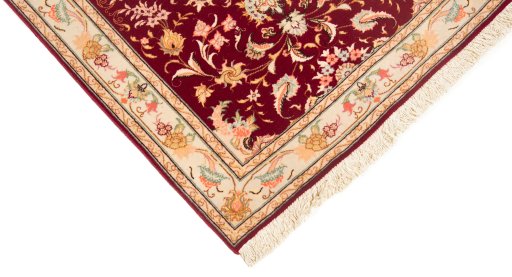 Corner detail of New Tabriz Silk rug showing border pattern and Wool pile