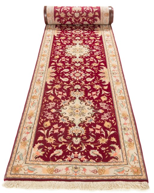 Close-up detail of New Tabriz Silk rug from Iran / Persia showing Wool weave