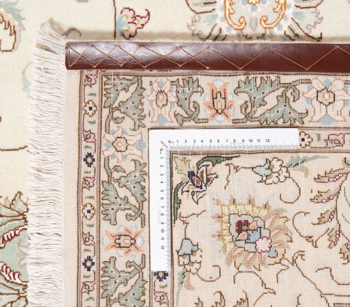 Close-up detail of New Tabriz Silk rug from Iran / Persia showing Wool weave