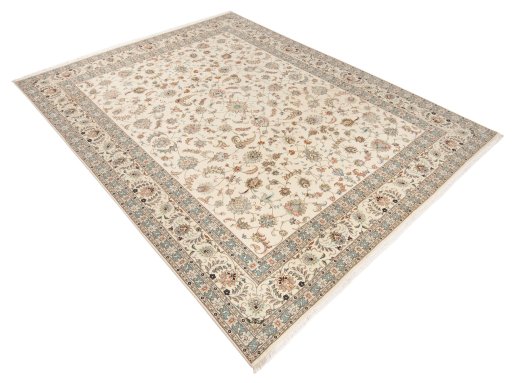 Backside of handmade New Tabriz Silk rug showing knot structure and weave density