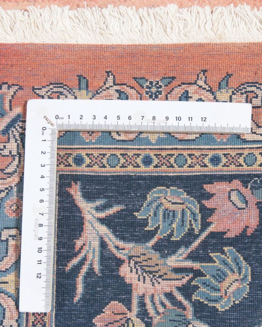 Close-up detail of New Tabriz Silk rug from Iran / Persia showing Wool weave