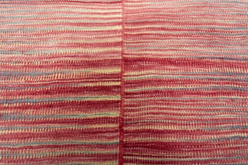 Backside of handmade New Kilim Kiasar rug showing knot structure and weave density