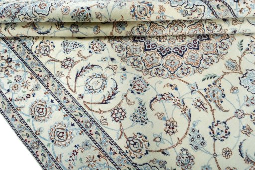 Close-up detail of 2000s Nain rug from Iran / Persia showing Wool weave