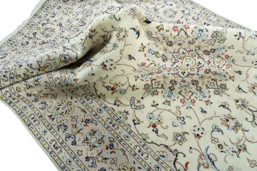 Surface texture of New Kashan rug with natural Wool and intricate pattern