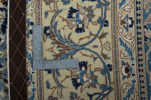 Backside of handmade 2000s Nain rug showing knot structure and weave density