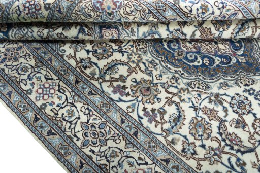 Close-up detail of 2000s Nain rug from Iran / Persia showing Wool weave