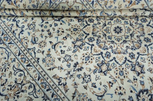 Close-up detail of 2000s Kashan rug from Iran / Persia showing Wool weave