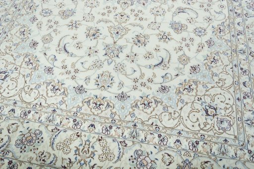 Close-up detail of 2000s Nain rug from Iran / Persia showing Wool weave