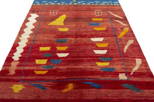 Surface texture of 2000s Persian Gabbeh rug with natural Wool and intricate pattern