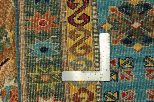 Backside of handmade New Kazak rug showing knot structure and weave density