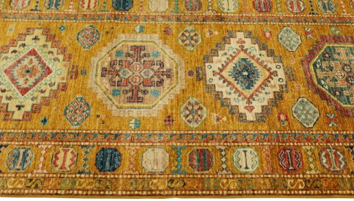 Close-up detail of New Kazak rug from Pakistan showing Wool weave
