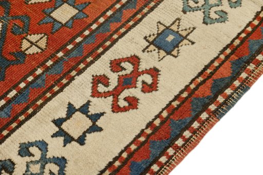 Central medallion detail of 1900s Kazak rug from Armenia
