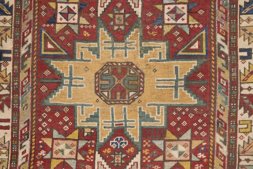Central medallion detail of 1900s Kazak rug from Armenia