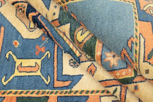 Corner detail of New Kazak rug showing border pattern and Wool pile