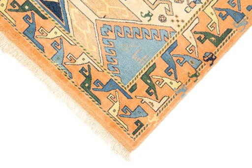 Backside of handmade New Kazak rug showing knot structure and weave density