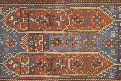 Close-up detail of 1900s Kazak rug from Armenia showing Wool weave
