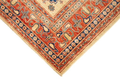 Backside of handmade New Kazak rug showing knot structure and weave density
