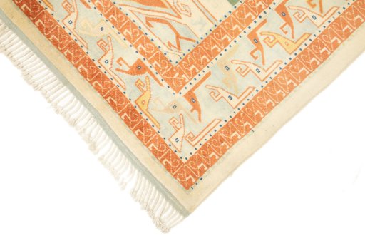 Backside of handmade New Kazak rug showing knot structure and weave density