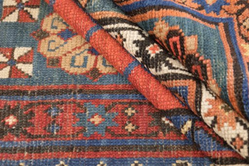 Full view of 1900s Kazak rug from Armenia, 257 × 122 cm in Multi Color tones