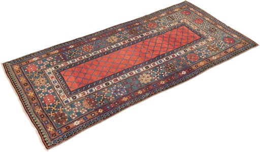 Corner detail of 1900s Kazak rug showing border pattern and Wool pile