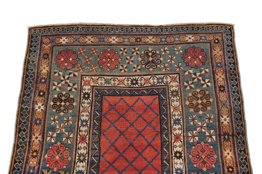 Surface texture of 1900s Kazak rug with natural Wool and intricate pattern
