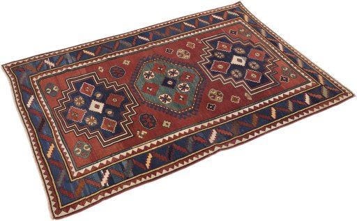 Corner detail of 1900s Kazak rug showing border pattern and Wool pile
