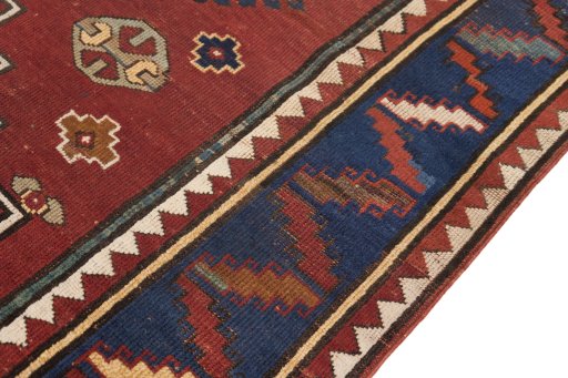 Central medallion detail of 1900s Kazak rug from Armenia