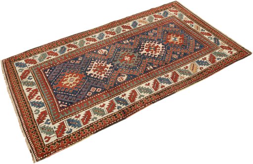Corner detail of 1880s Kazak rug showing border pattern and Wool pile
