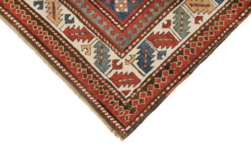 Backside of handmade 1880s Kazak rug showing knot structure and weave density