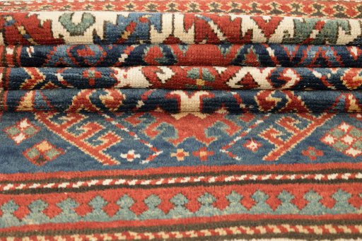 Full view of 1880s Kazak rug from Armenia, 227 × 127 cm in Dark blue tones