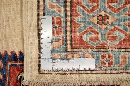 Full view of New Kazak rug from Pakistan, 194 × 155 cm in Cream tones