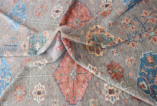 Backside of handmade New Kazak rug showing knot structure and weave density