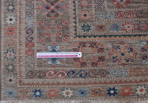 Central medallion detail of New Kazak rug from Pakistan