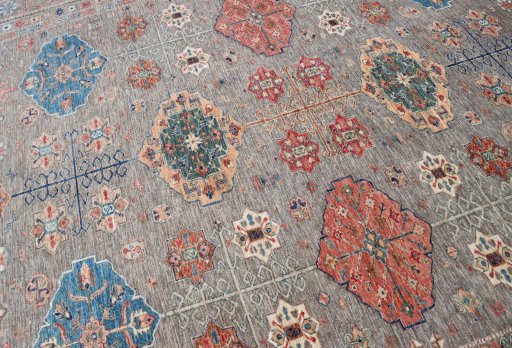 Central medallion detail of New Kazak rug from Pakistan
