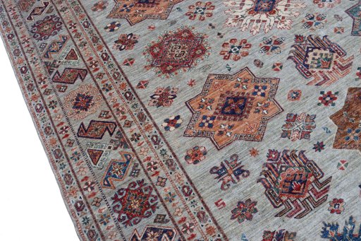 Backside of handmade New Kazak rug showing knot structure and weave density