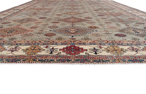 Corner detail of New Kazak rug showing border pattern and Wool pile