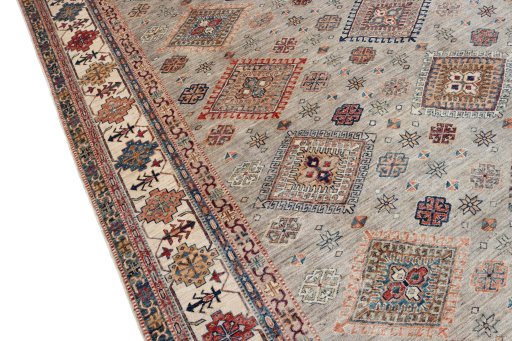 Backside of handmade New Kazak rug showing knot structure and weave density
