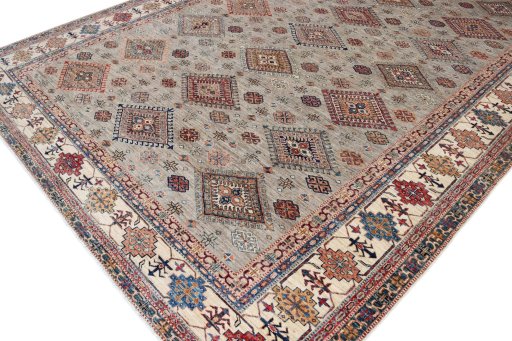 Full view of New Kazak rug from Pakistan, 376 × 280 cm in Multi Color tones