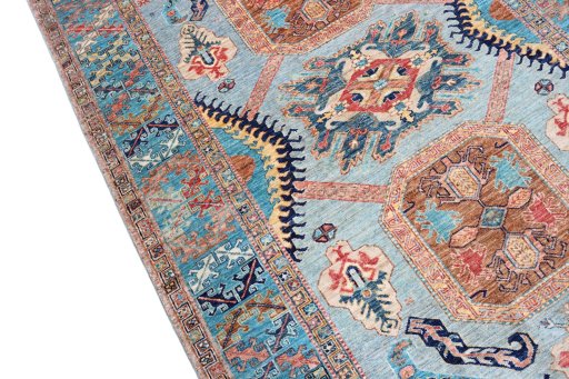 Backside of handmade New Kazak rug showing knot structure and weave density