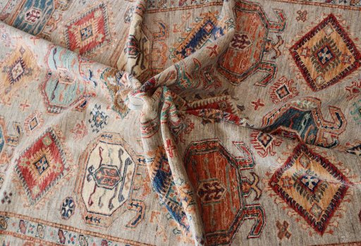 Backside of handmade New Kazak rug showing knot structure and weave density