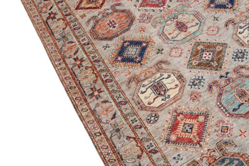 Backside of handmade New Kazak rug showing knot structure and weave density
