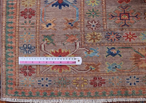 Central medallion detail of New Kazak rug from Pakistan