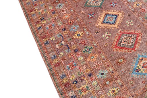 Backside of handmade New Kazak rug showing knot structure and weave density