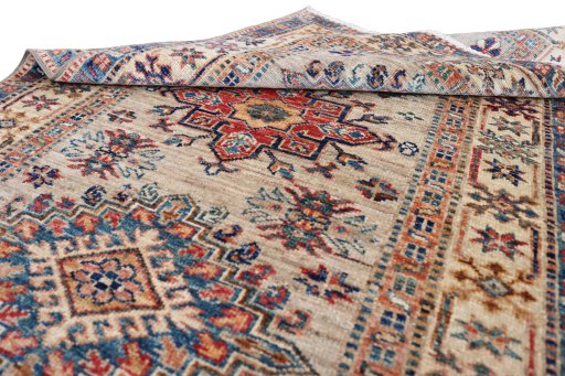 Surface texture of New Kazak rug with natural Wool and intricate pattern