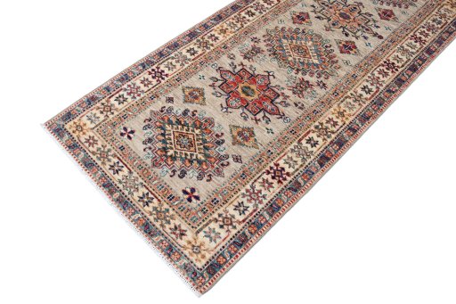 Full view of New Kazak rug from Pakistan, 246 × 82 cm in Multi Color tones