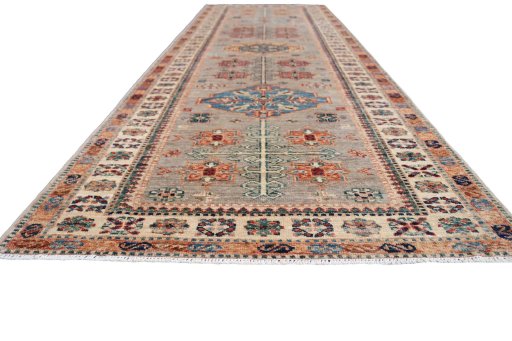 Corner detail of New Kazak rug showing border pattern and Wool pile