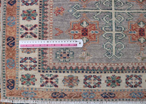 Central medallion detail of New Kazak rug from Pakistan