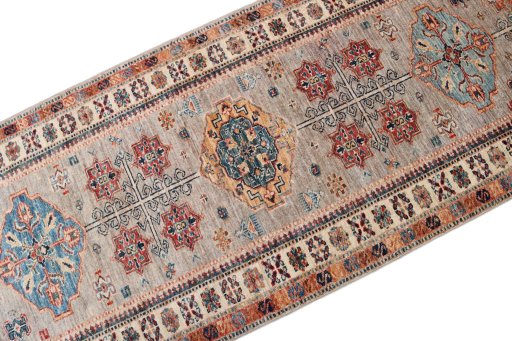 Central medallion detail of New Kazak rug from Pakistan