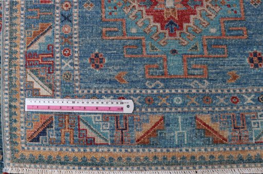 Central medallion detail of New Kazak rug from Pakistan